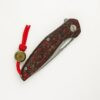 Shirogorov 111 Ignis – Titanium Handle Detail Titanium handle scales detail on Shirogorov 111 Ignis special edition knife